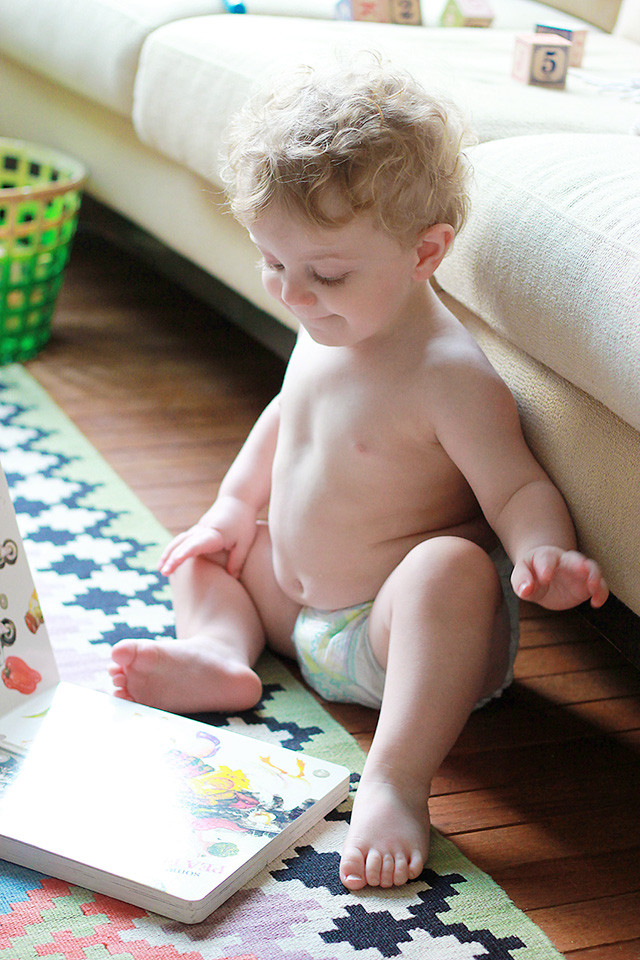 This is 18 months old: Toddler who loves to play, read, and climb wearing Pampers Cruisers from Target | A Girl Named PJ