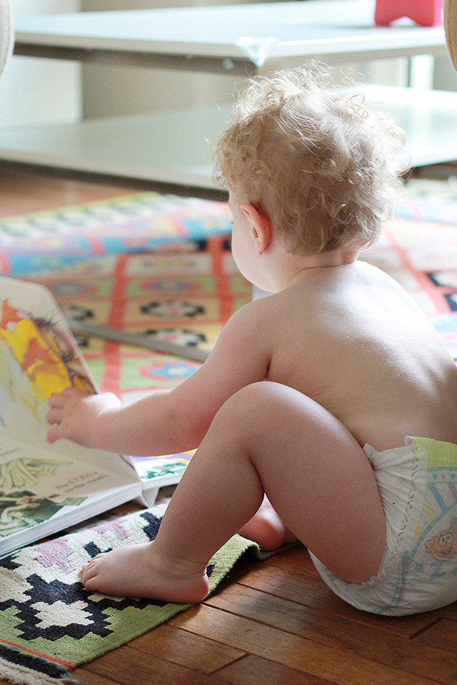 Reading board books in Pampers Cruisers at 18 months old | A Girl Named PJ